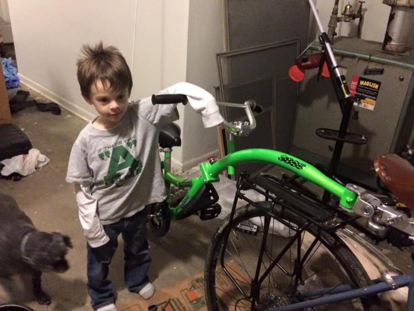 Tag along, green bike, sons new bike